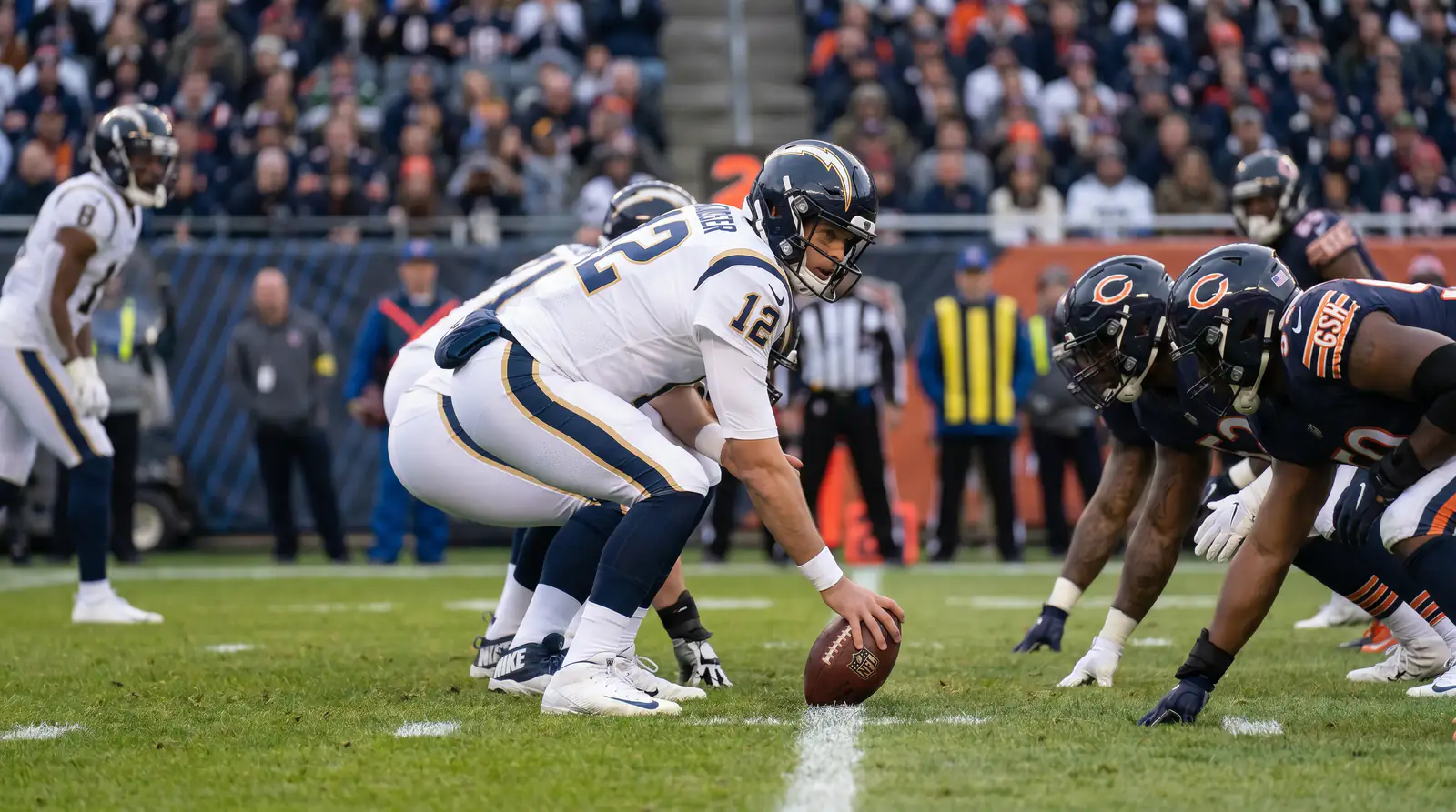 NFL quarterback under centre representing a heavy moneyline favourite about to take the snap