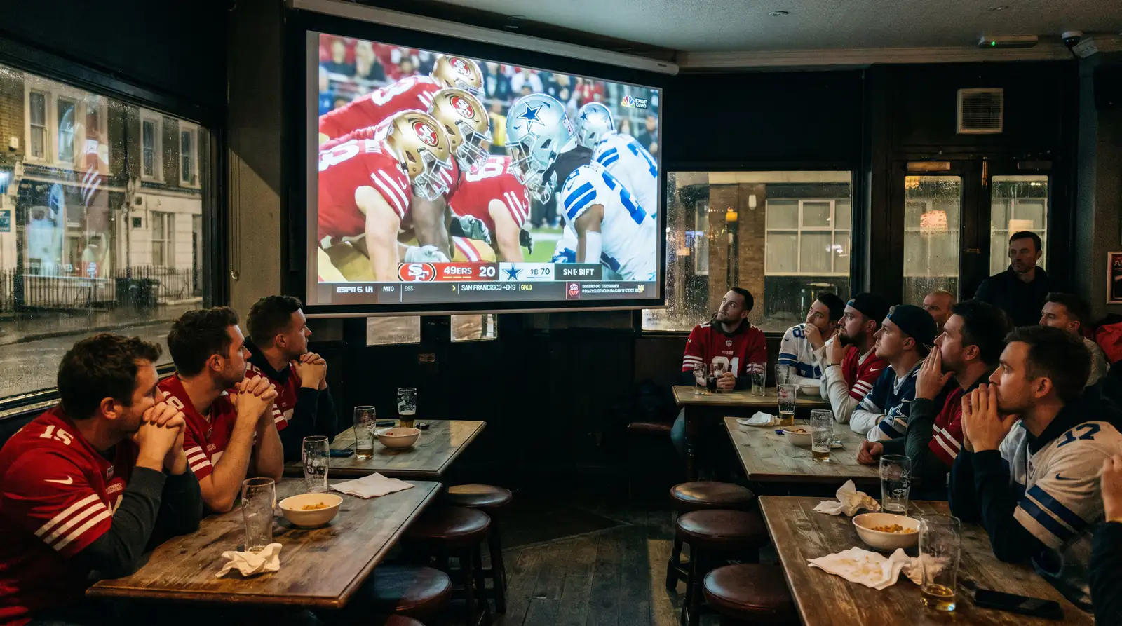 UK sports bar showing NFL playoffs late at night with fans watching closely