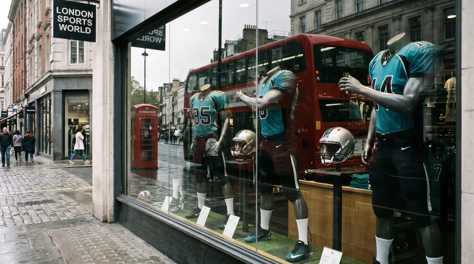 Retail shop window display of NFL jerseys in London with multiple Jaguars-coloured kits prominently shown